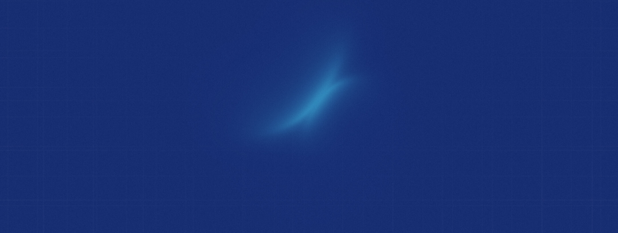 A faint, soft blue light or streak appears against a deep blue, subtly textured background.